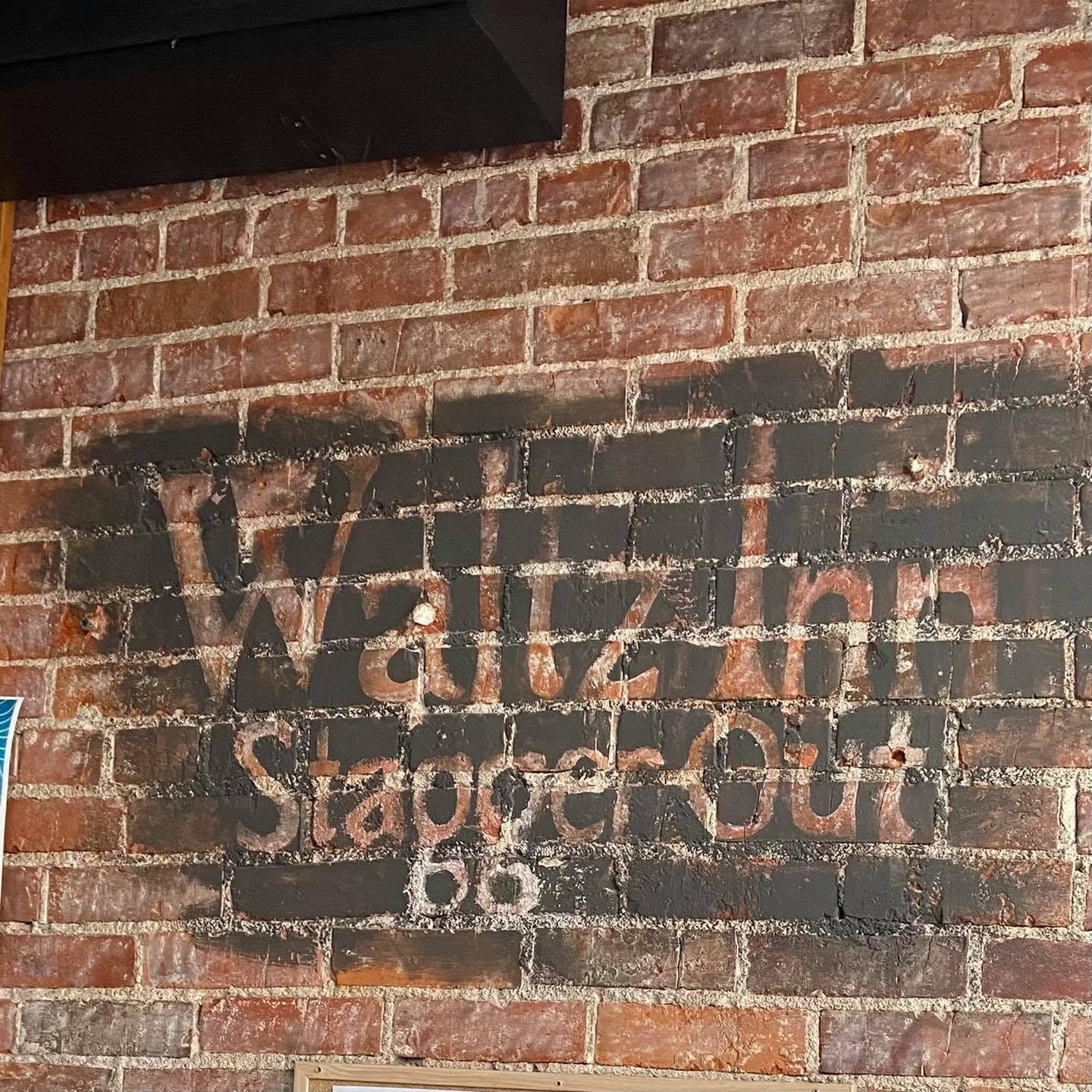 Waltz Inn -- Stagger Out! '68 -- the original name painted on Ruby's brick wall